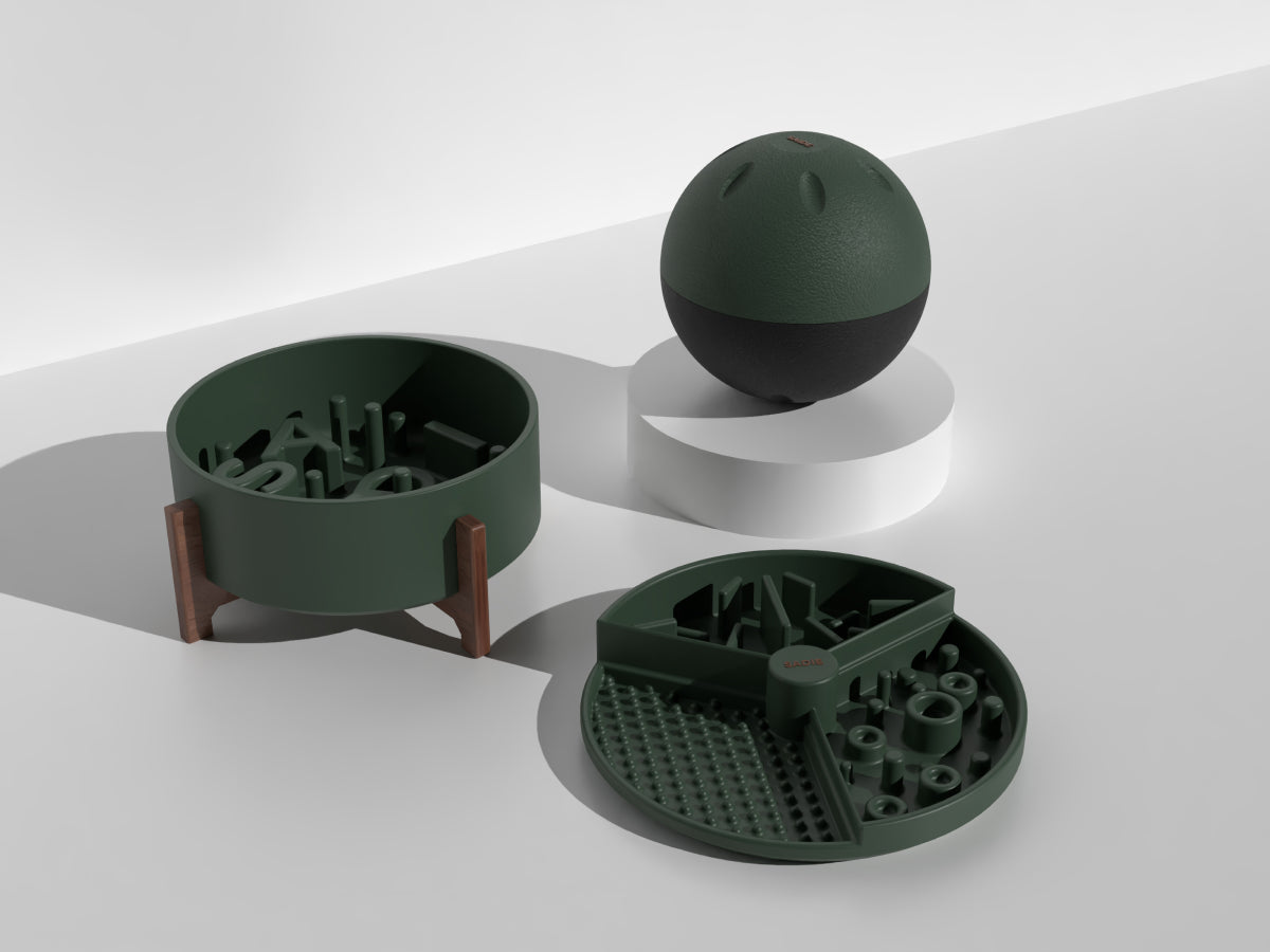 Green pet toys on a white surface