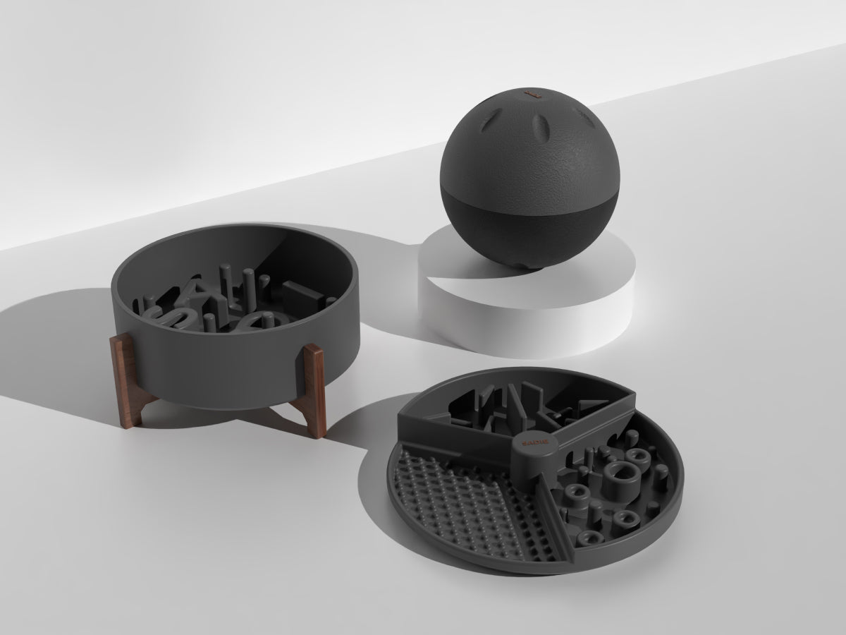 Black 3D-printed objects on a white surface